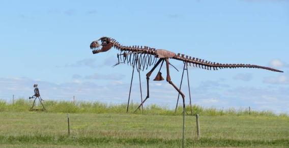 Were can you see a man walking a dinosaur? At the “Porter Sculpture Park" in Montrose, South Dakota (population 442)