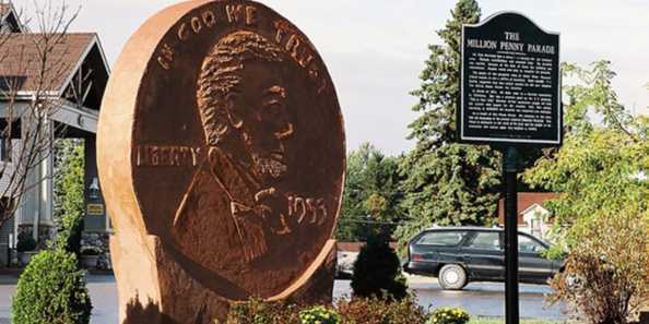 A penny for your thoughts at the World's Largest Penny in Woodruff, Wisconsin: (population 1,956)