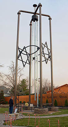 I think I heard the "World's Largest Wind Chime" in Casey IL (population 2264)